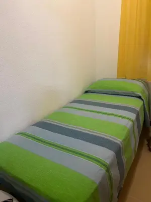 two beds sitting next to each other in a room at Profumo di Mare 2 in Alcamo Marina
