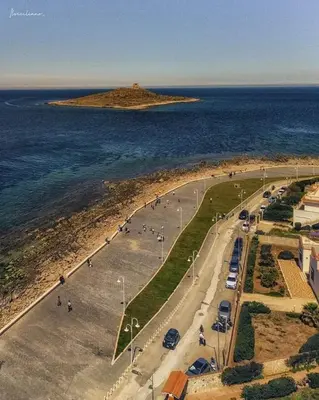 an aerial view of a parking lot next to the ocean at Sole e mare 1 in Isola delle Femmine