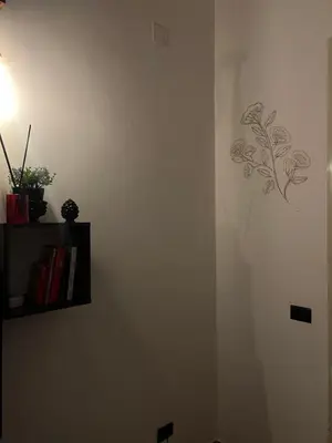 a wall with a drawing of a plant on it at FM Home Stadio Renzo Barbera in Palermo