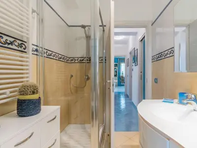 a bathroom with a shower and a sink at Villa Olivella by Interhome in Cefalù