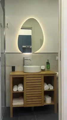 a bathroom with a sink and a mirror at LA SPLENDIDA Dimora di Charme - Luxury Loft Palermo in Palermo
