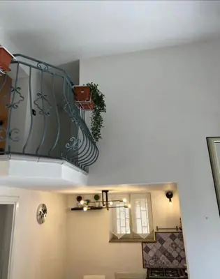 a staircase in a house with a stair case at Sicily guest house 2 in Palermo