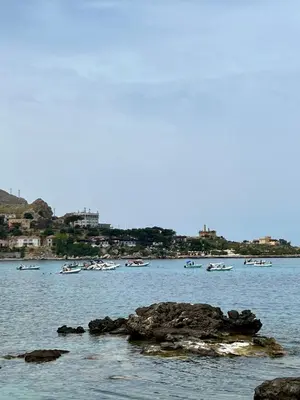 a group of boats in a large body of water at Casa Sciàlari in Palermo