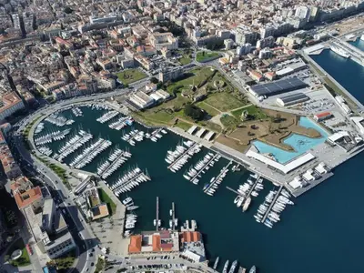 an aerial view of a marina with boats at Aerial House in Palermo