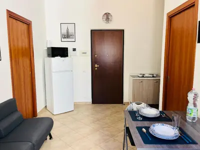 a door in a room with a mat in front of it at Politeama House 148 in Palermo