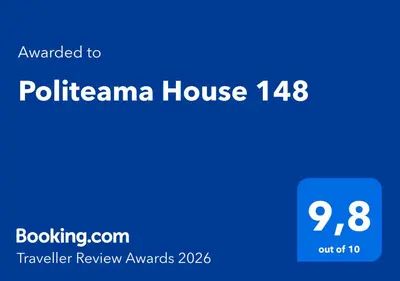 a blue screen with the words polisanama house at Politeama House 148 in Palermo
