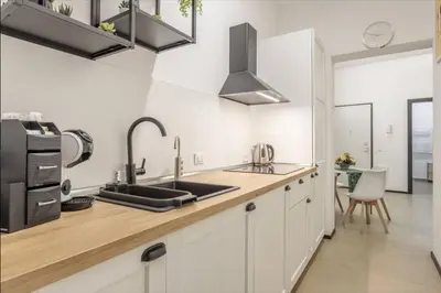 a kitchen with a sink and a counter top at La casa di Alice in Palermo