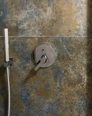 a metal object on a wall with a shower nozzle at Villareale Flat - Palermo City Center Free Parking in Palermo