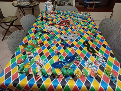 a multicolored table with superheroes on top of it at Conchiglia azzurra in Trappeto