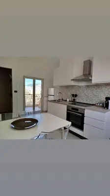 a kitchen with a sink and a counter top at 7 floor in Palermo