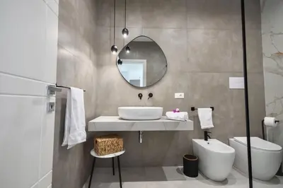 a bathroom with a sink and a mirror at BellaVista in Cinisi