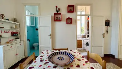 a dining room with a table with a plate on it at La Terrazza sul Mare in Palermo