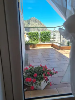 a view from a window of a patio with flowers at CITY HOUSE & FREE PARKING by Perry-Holiday moderno, panoramico e comodo fino a 6 ospiti in Palermo