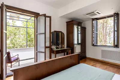 a bedroom with a bed and a window at Villa Angelica by Wonderful Italy in Castellammare del Golfo