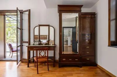 a dressing room with a desk and a mirror at Villa Angelica by Wonderful Italy in Castellammare del Golfo