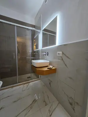 a bathroom with a sink and a shower at Ma Gra Ví in Terrasini