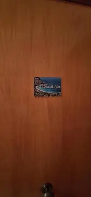 a sign that says order of the abyss on a wooden door at Sweet Dreams a casa di Alex in Palermo