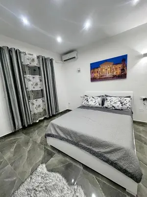 a bedroom with a large bed in a room at Home Mia in Palermo