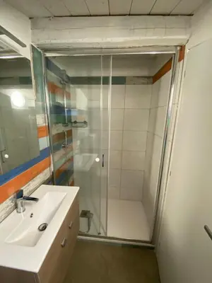 a bathroom with a shower and a sink at L'Oasi del Tirreno in Lascari