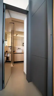 a hallway leading to a bathroom with a bedroom at Trinacria Marina Apartment in Palermo