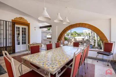 a dining room with a table and chairs at Amazing Villa with pool & Jacuzzi in Balestrate