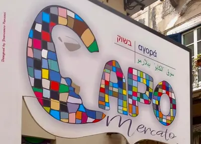 a sign that reads pida overword mecca at Ginevra House in Palermo