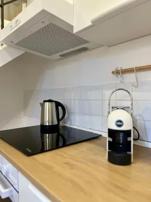 a coffee maker sitting on a counter in a kitchen at Chicca House in Palermo