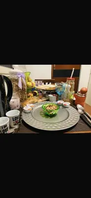 a table with a plate of food on it at Casa ivan in Palermo