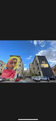 a picture of a building with a picture of a woman at La casa di Gabri in Palermo