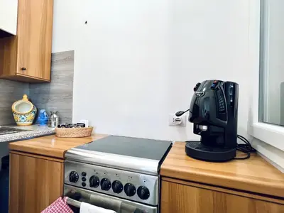 a black mixer sitting on top of a kitchen counter at Stella Marina in Carini