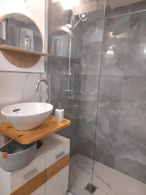 a bathroom with a sink and a shower at Sweet home Palermo in Palermo