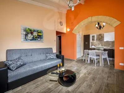 a living room with a couch and a table at Villa Mari e Monti by Interhome in Castellammare del Golfo