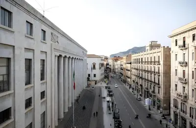 a view of a street in a city with buildings at Palazzo Monteleone Suite in Palermo