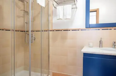a bathroom with a shower and a sink at Palazzo Monteleone Suite in Palermo