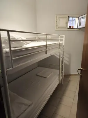 an empty bunk bed in a small room at Casa Felice in Misilmeri