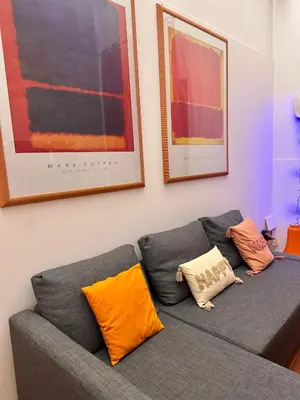 a black entertainment center with a flat screen tv at BLU Fronte Mare in Palermo