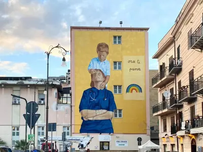 a large billboard on the side of a building at Orleans Apartment in Palermo