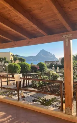 a view of the ocean from the patio of a house at Macari House in Macari