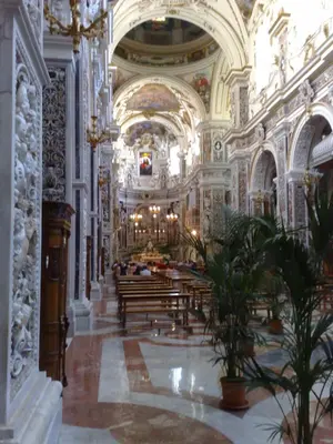 a large room with a church with potted plants in it at VILLA BUTTERFLY 2 a FEW STEPS FROM THE SEA in Capaci