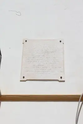 a piece of paper with writing on a wall at Casa Vacanze In Piazza in Terrasini
