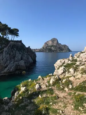 a view of a body of water with rocks at Casa Vacanze Villa Lena in Santa Flavia