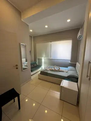 a bedroom with a bed and a window at La Piazzetta a Mare Holiday House in Sferracavallo