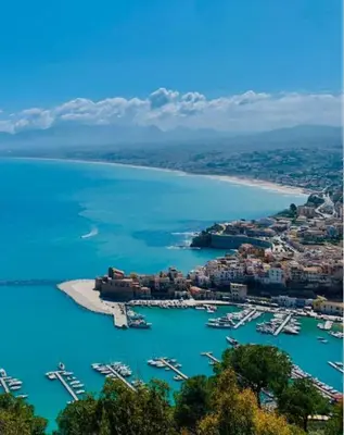 an aerial view of a harbor with boats in the water at Onda blu in Carini