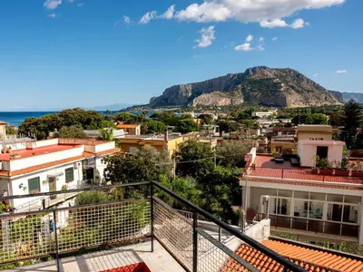 a view of the city from the balcony at Villa Rosa Mondello in Mondello