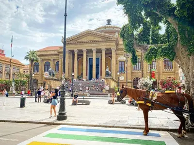 a horse standing in front of a building at 145 Maqueda Palermo in Palermo