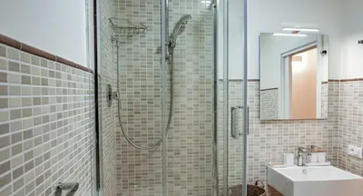 a bathroom with a shower and a sink at Villa Regina ai Faraglioni di Scopello in Scopello