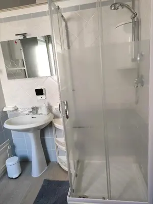 a bathroom with a shower and a sink at Casa Magarìa in Palermo