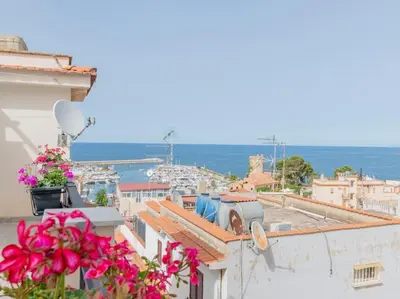 a view from the roof of a building with flowers at Casa Vacanze Ginevra in Mandra Capreria
