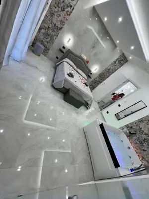 an overhead view of a kitchen with white marble floors at Marisol in Palermo