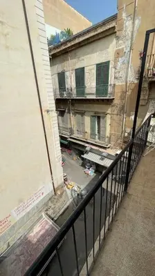 a view of a building from a balcony at caZA' Capo 40MQ nel centro di Palermo in Palermo